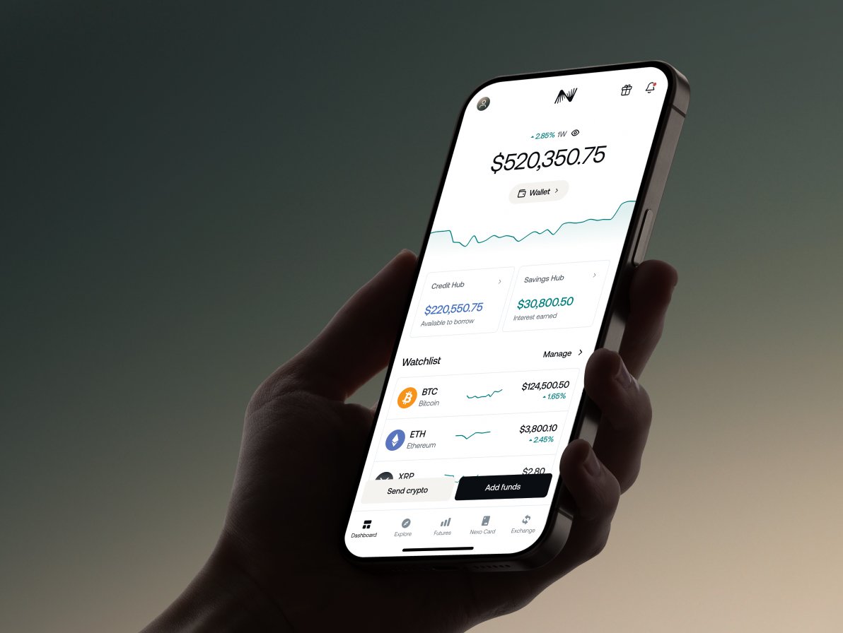 Hand holding a phone with the Nexo app open