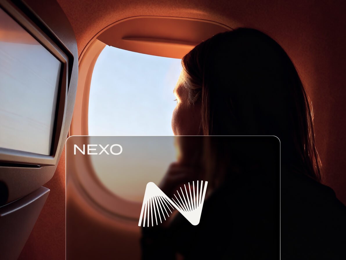 nexo card woman airplane window